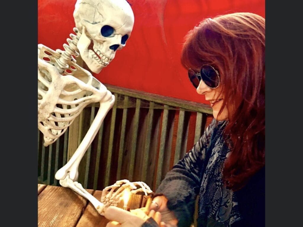Carolyn Wonderland with skeleton